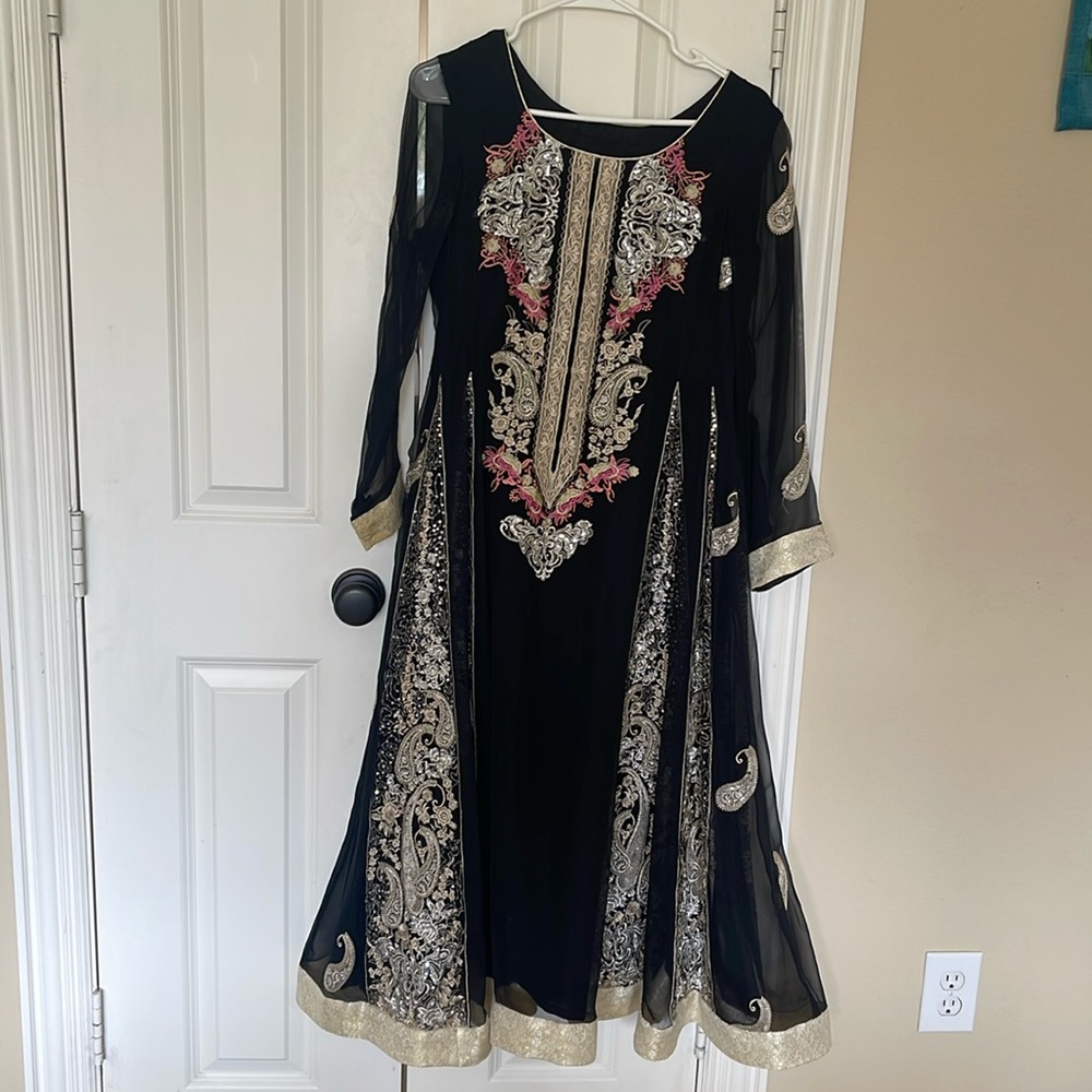 Pakistani Indian embroidered kurta.
